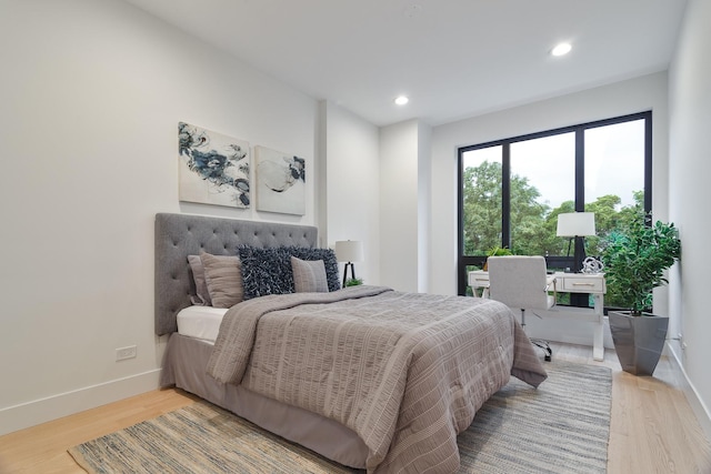 2049 W Race Ave, Chicago, IL 60612 - bedroom with baseboards, light wood-type flooring, and recessed lighting