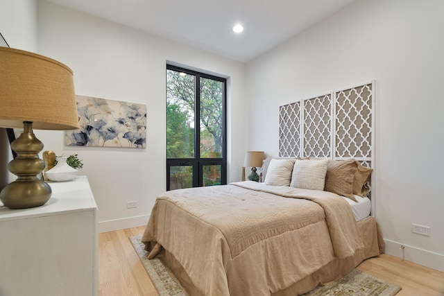 2049 W Race Ave, Chicago, IL 60612 - bedroom featuring light wood finished floors, baseboards, and recessed lighting