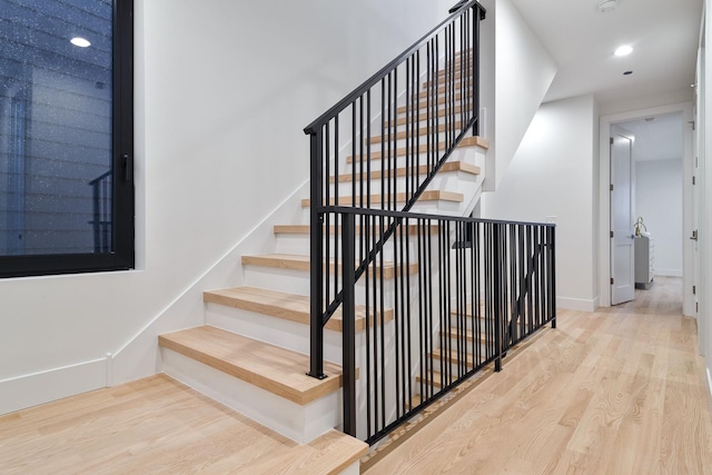 2049 W Race Ave, Chicago, IL 60612 - staircase with wood finished floors and recessed lighting