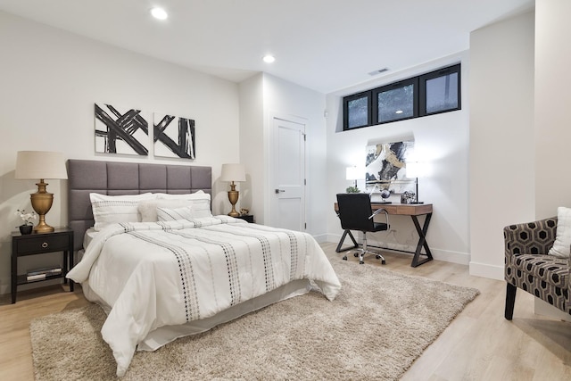 2049 W Race Ave, Chicago, IL 60612 - bedroom with light wood finished floors, an office area, recessed lighting, and baseboards