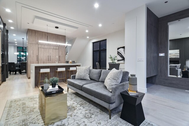 2049 W Race Ave, Chicago, IL 60612 - living room with light wood-style floors and recessed lighting