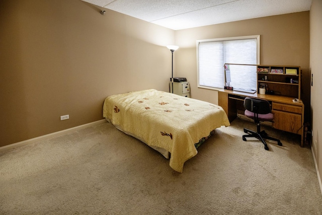 7021 W Touhy Ave Unit 305, Niles, IL 60714 - bedroom with carpet flooring, an office area, and baseboards