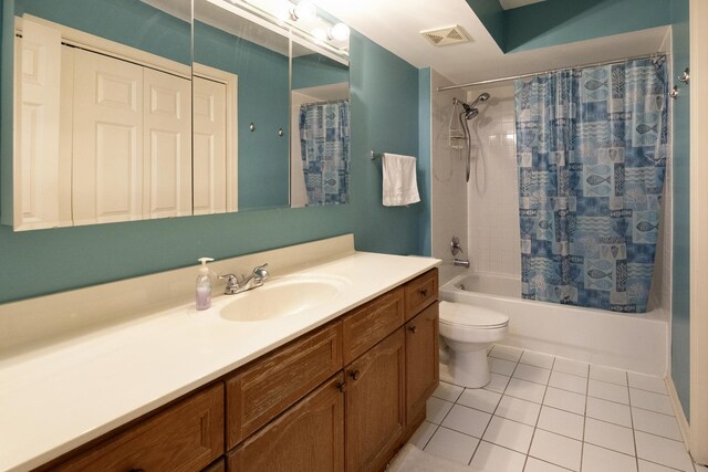 7021 W Touhy Ave Unit 305, Niles, IL 60714 - bathroom featuring tile patterned flooring, shower / bath combo, vanity, and toilet