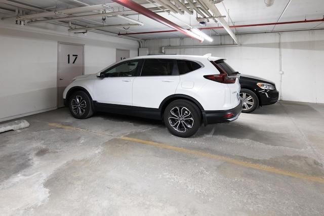 7021 W Touhy Ave Unit 305, Niles, IL 60714 - view of parking deck