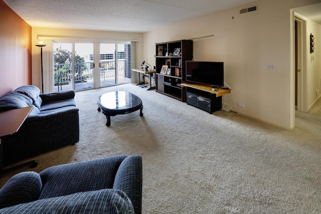 7021 W Touhy Ave Unit 305, Niles, IL 60714 - living area featuring carpet flooring and french doors