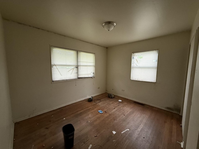 1869 Summit Ave, Kankakee, IL 60901 - unfurnished room featuring wood finished floors and baseboards