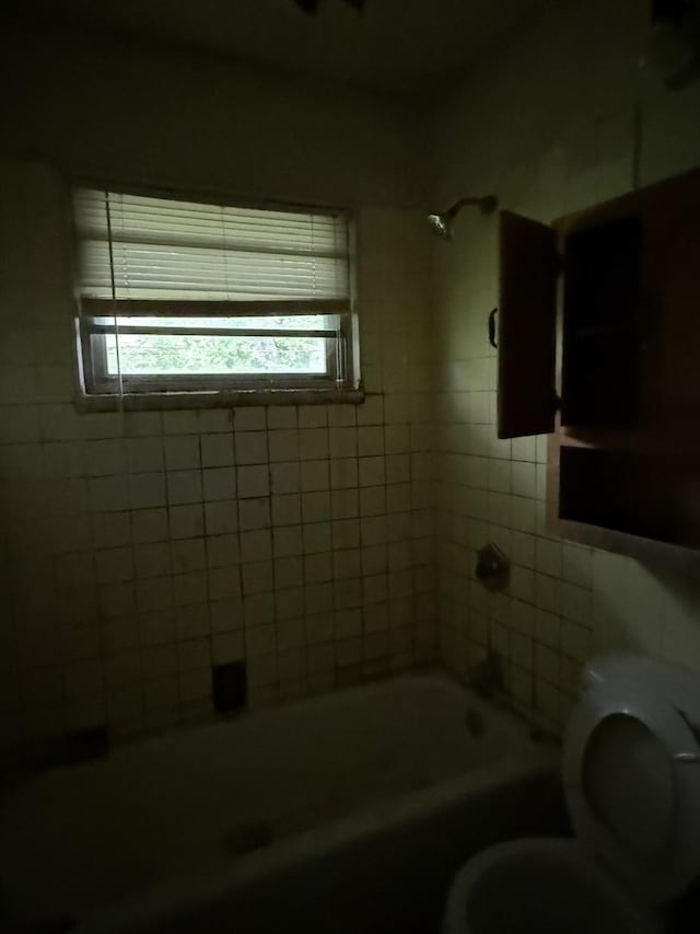 1869 Summit Ave, Kankakee, IL 60901 - bathroom featuring toilet and tub / shower combination