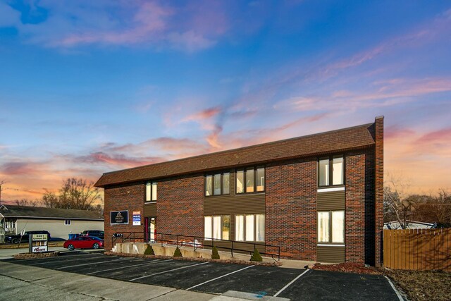 3201 Union Ave, Steger, IL 60475 - view of property featuring uncovered parking and fence