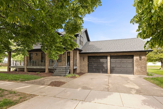 24202 W Commercial St, Plainfield, IL 60544 - view of property hidden behind natural elements with brick siding, concrete driveway, a garage, and roof with shingles