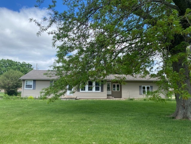 206 E Front St, Granville, IL 61326 - back of property featuring a lawn