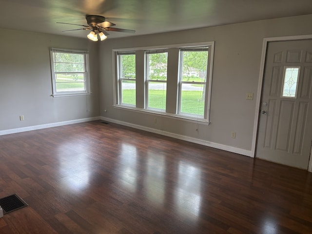 206 E Front St, Granville, IL 61326 - entrance foyer with baseboards, a ceiling fan, and dark wood-style flooring