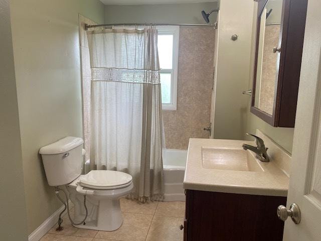 206 E Front St, Granville, IL 61326 - full bath featuring toilet, tile patterned flooring, vanity, and shower / bath combination with curtain