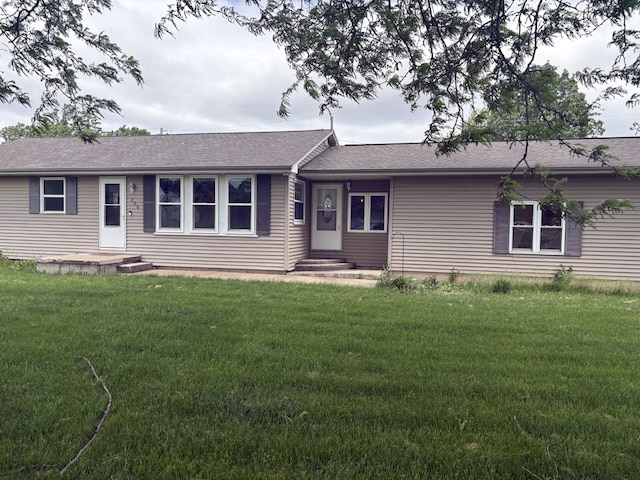 206 E Front St, Granville, IL 61326 - ranch-style home featuring a front yard and roof with shingles