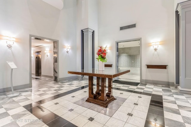 70 W Huron St Unit 1607, Chicago, IL 60654 - building lobby featuring a towering ceiling
