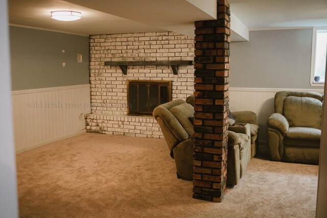 48 Norman St, Kankakee, IL 60901 - living room with wainscoting, carpet floors, ornamental molding, and a fireplace