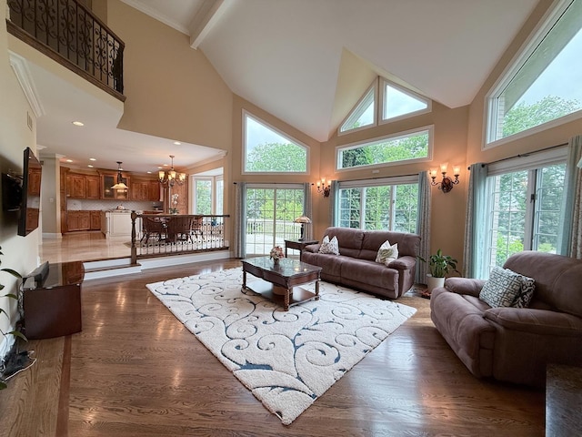 5 Todor Ct, Burr Ridge, IL 60527 - living room with a chandelier, high vaulted ceiling, plenty of natural light, wood finished floors, and recessed lighting