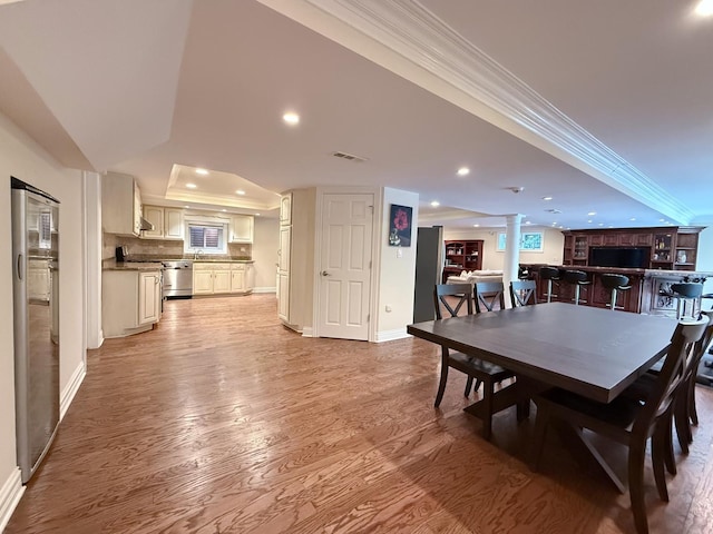 5 Todor Ct, Burr Ridge, IL 60527 - dining area with ornamental molding, decorative columns, light wood-type flooring, baseboards, and recessed lighting