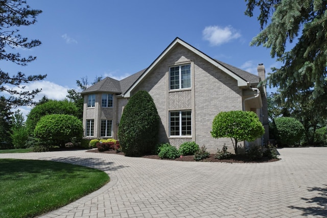 5 Todor Ct, Burr Ridge, IL 60527 - view of front facade with a chimney and brick siding