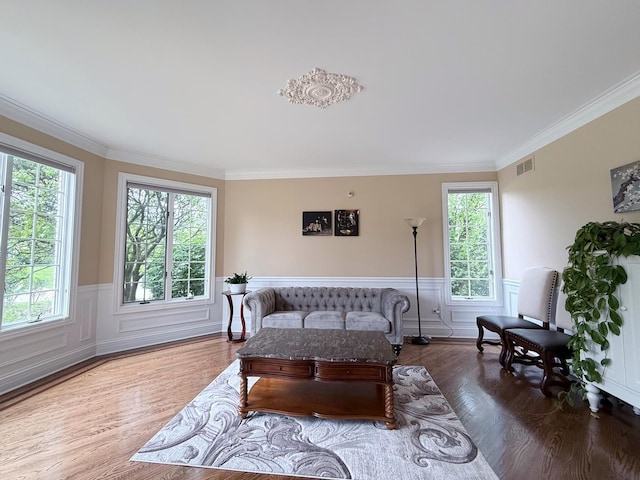 5 Todor Ct, Burr Ridge, IL 60527 - living room featuring crown molding, wood finished floors, and wainscoting
