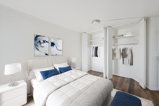 155 N Harbor Dr Unit 610, Chicago, IL 60601 - bedroom with wood finished floors, baseboards, and a closet