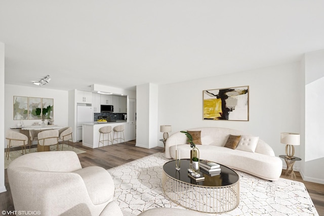 155 N Harbor Dr Unit 610, Chicago, IL 60601 - living room featuring dark wood-style floors and baseboards