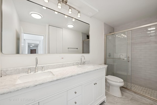 155 N Harbor Dr Unit 610, Chicago, IL 60601 - full bathroom with marble finish flooring, a shower stall, toilet, and double vanity