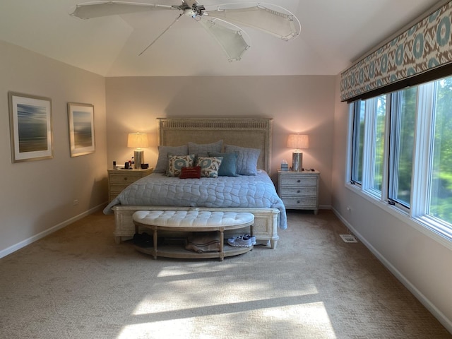 1312 Galloway Dr, Woodstock, IL 60098 - carpeted bedroom with vaulted ceiling, baseboards, and ceiling fan