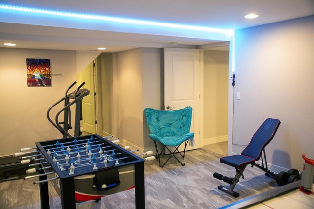 recreation room featuring recessed lighting and baseboards