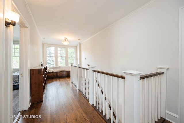 944 Fair Oaks Ave, Oak Park, IL 60302 - hallway with plenty of natural light, dark wood-type flooring, an upstairs landing, and crown molding
