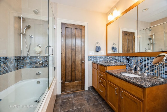 944 Fair Oaks Ave, Oak Park, IL 60302 - full bath with vanity, combined bath / shower with glass door, tile patterned floors, and backsplash