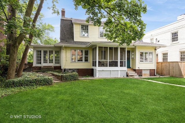 944 Fair Oaks Ave, Oak Park, IL 60302 - rear view of property with a sunroom, entry steps, a chimney, and roof with shingles