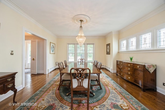 944 Fair Oaks Ave, Oak Park, IL 60302 - dining space featuring a chandelier, crown molding, a baseboard heating unit, and wood finished floors