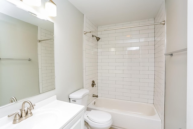 bathroom with toilet, vanity, and shower / bath combination