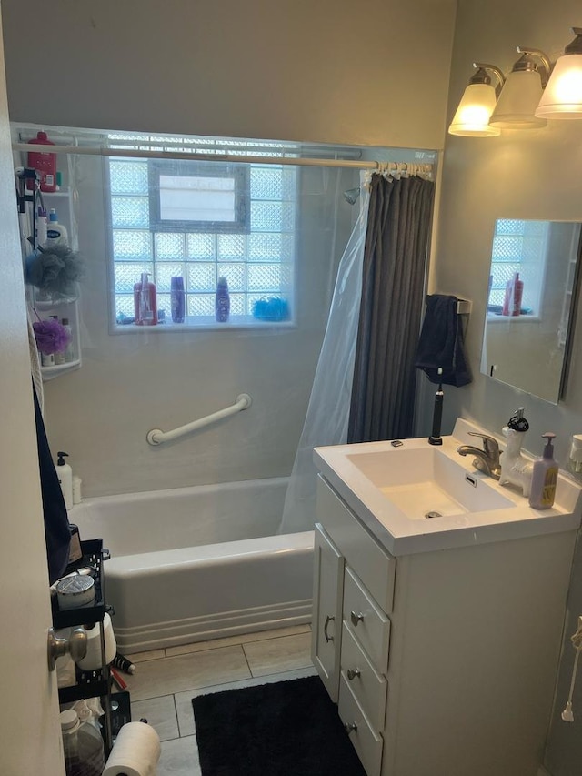 215-217 E Vermont St, Villa Park, IL 60181 - bathroom featuring tile patterned floors, healthy amount of natural light, vanity, and shower / tub combo