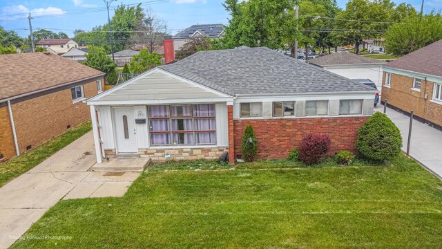 4536 W 79th Pl, Chicago, IL 60652 - view of front of property featuring roof with shingles, a front yard, and brick siding