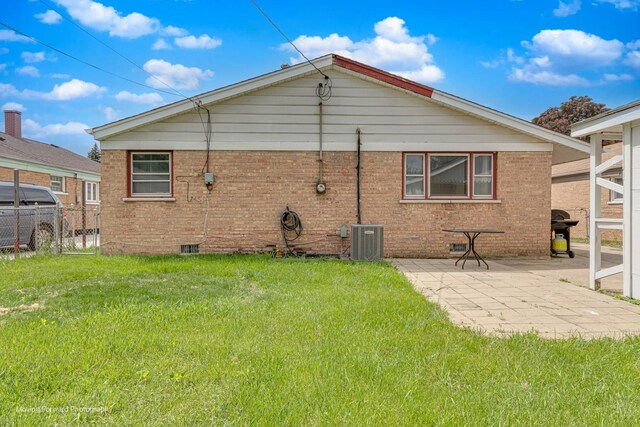 4536 W 79th Pl, Chicago, IL 60652 - back of house with crawl space, central AC, brick siding, and a patio area