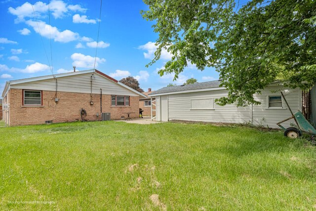 4536 W 79th Pl, Chicago, IL 60652 - rear view of property with central AC, a lawn, crawl space, a patio, and brick siding