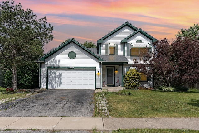26244 S Cherry Ln, Monee, IL 60449 - traditional-style house with driveway, a lawn, and a garage