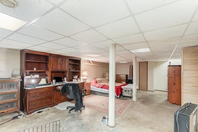 26244 S Cherry Ln, Monee, IL 60449 - bedroom featuring unfinished concrete flooring, a desk, and a paneled ceiling