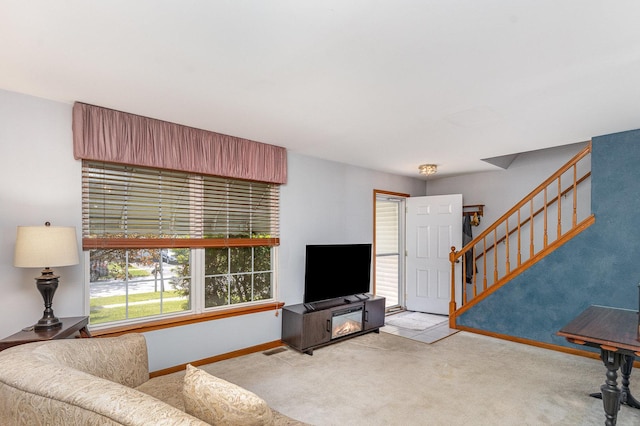 26244 S Cherry Ln, Monee, IL 60449 - living room with carpet floors, stairway, and baseboards
