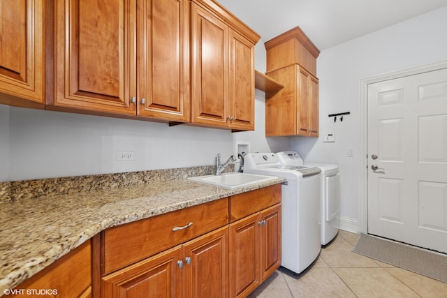 210 S Prospect St, Clarendon Hills, IL 60514 - clothes washing area featuring cabinet space, washing machine and clothes dryer, light tile patterned floors, and baseboards