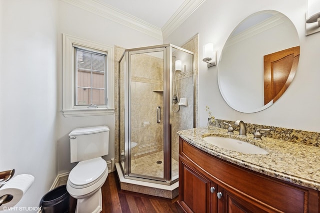 210 S Prospect St, Clarendon Hills, IL 60514 - bathroom featuring toilet, wood finished floors, a stall shower, crown molding, and vanity