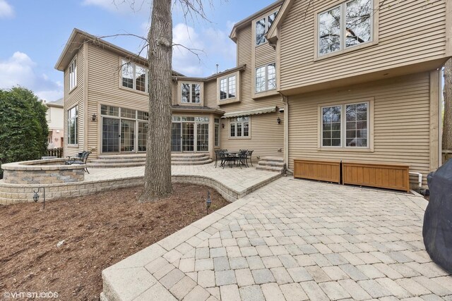 210 S Prospect St, Clarendon Hills, IL 60514 - back of property with entry steps and a patio