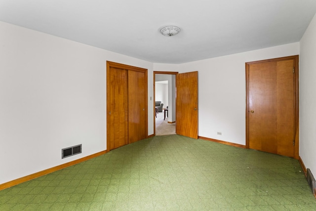 341 W Glen Flora Ave, Waukegan, IL 60085 - unfurnished bedroom with baseboards and carpet flooring