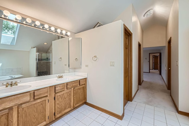 1574 Crowfoot Cir, Hoffman Estates, IL 60169 - full bath with a skylight, a shower stall, a bath, baseboards, and vaulted ceiling