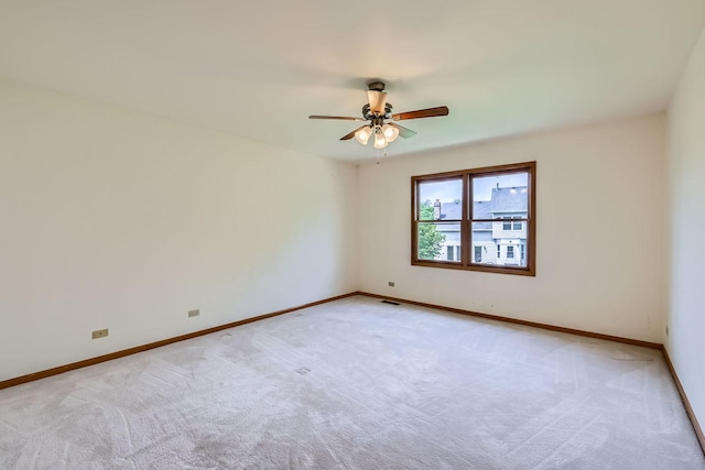 1574 Crowfoot Cir, Hoffman Estates, IL 60169 - unfurnished room with light colored carpet, baseboards, and ceiling fan