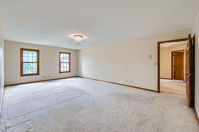 1574 Crowfoot Cir, Hoffman Estates, IL 60169 - spare room featuring light carpet and baseboards