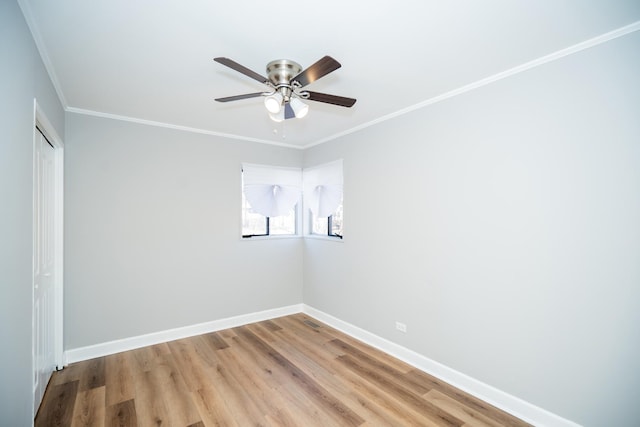 458 Tahoe St, Park Forest, IL 60466 - spare room with baseboards, ornamental molding, a ceiling fan, and light wood finished floors