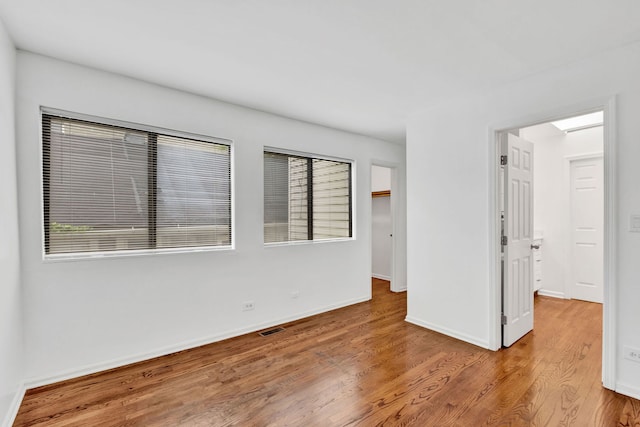 1815 N Bissell St Unit 3, Chicago, IL 60614 - spare room featuring wood finished floors and baseboards
