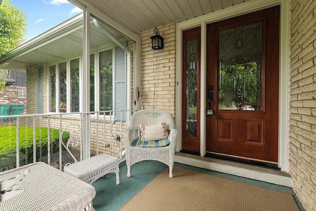 8144 Bunker Dr, Orland Park, IL 60462 - property entrance with brick siding and a porch